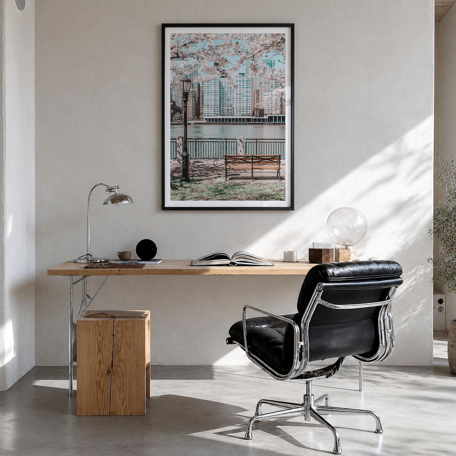 Cherry Blossoms no. 1 colorful photo poster – vertical wall art in black wood frame with white border, hanging on wall