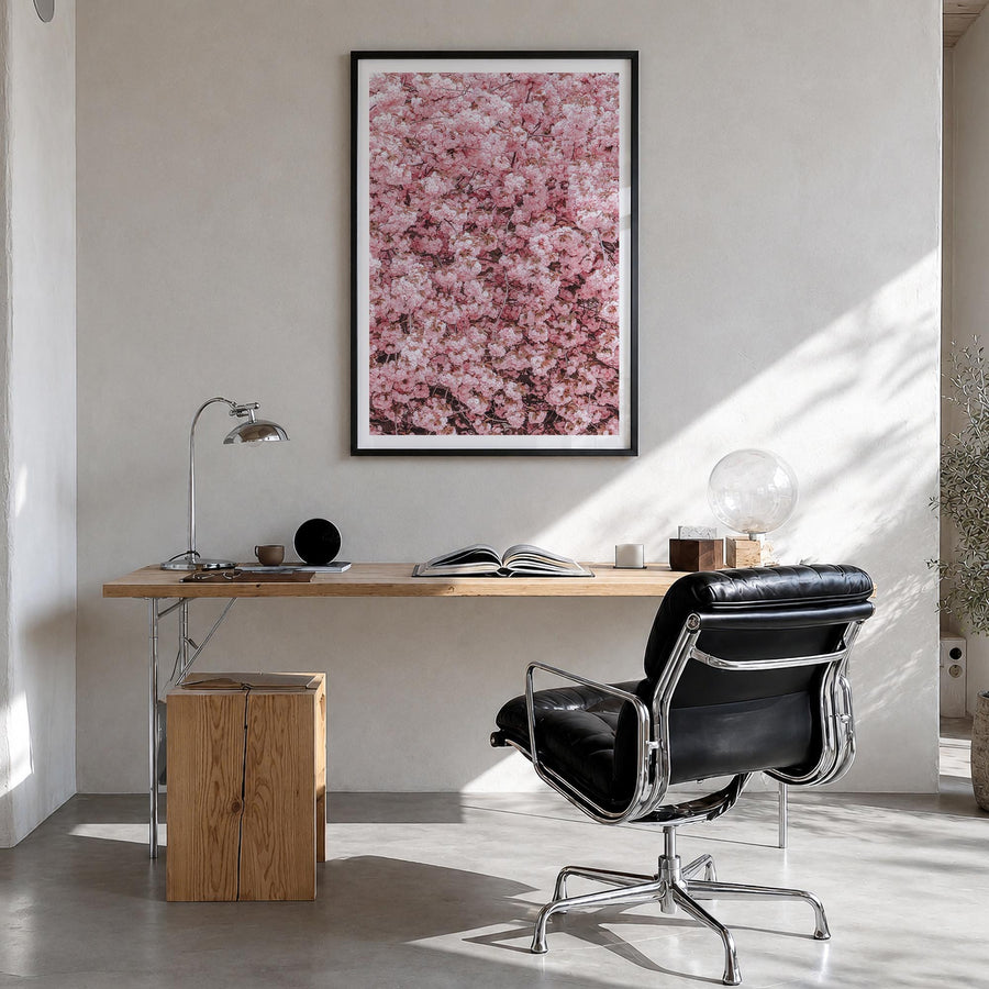 Cherry Blossoms no. 2 colorful photo poster – vertical wall art in black wood frame with white border, hanging on wall