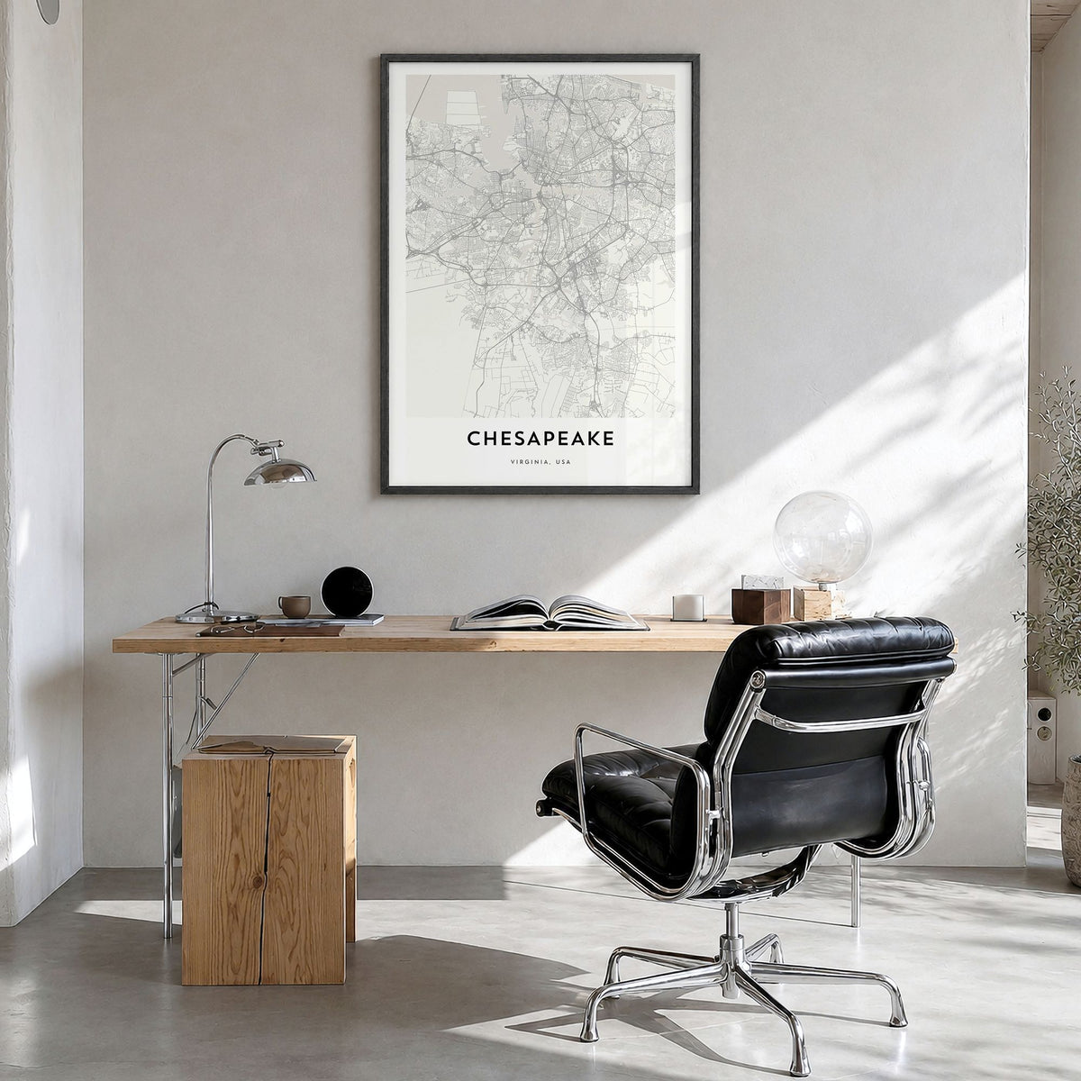 Chesapeake Map Poster in a black wood frame, hanging in a bright home office
