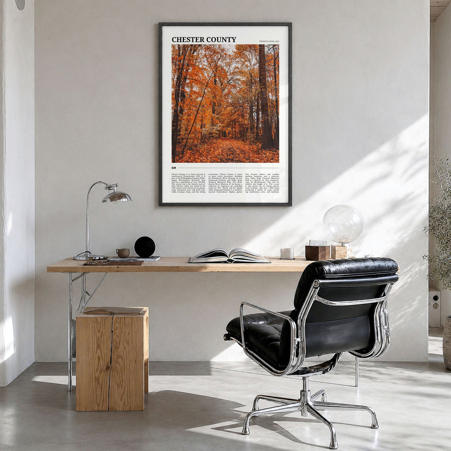 Chester County Travel Poster in a black wood frame, hanging in a bright home office