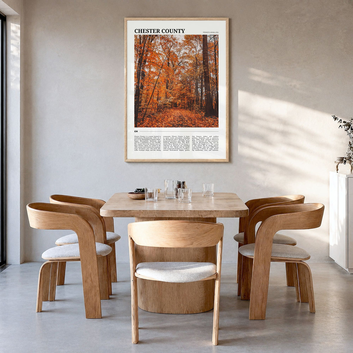 Chester County Travel Poster in a natural wood frame, hanging in a dining room