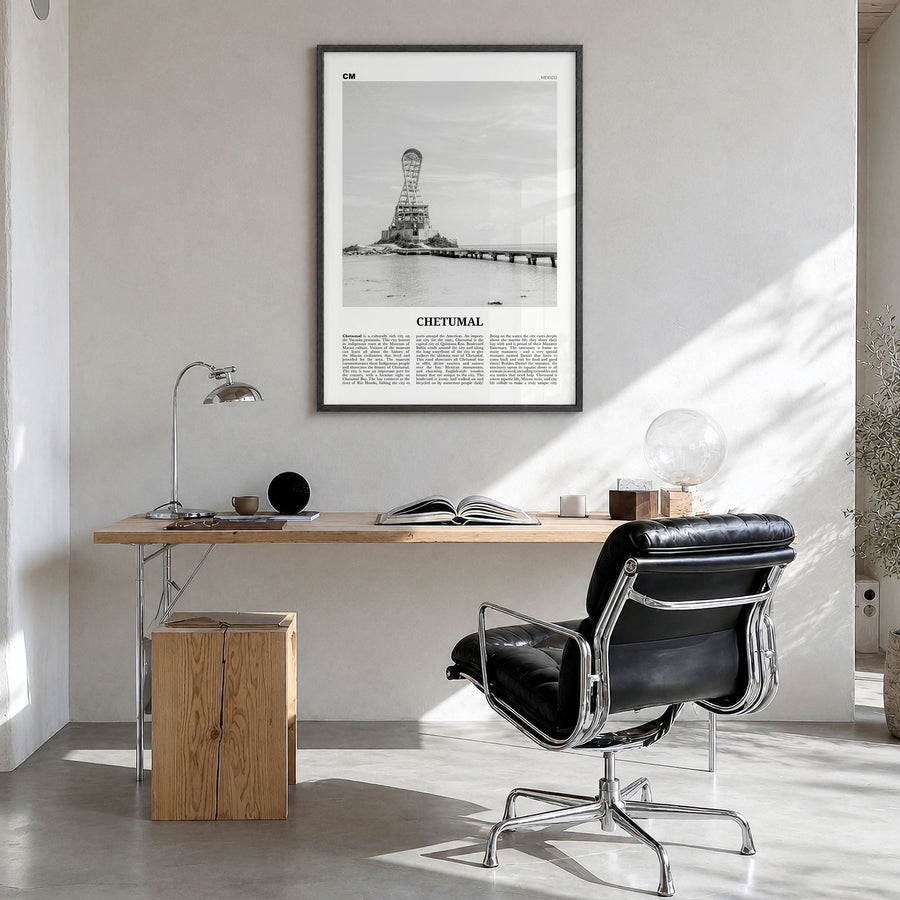 Chetumal Newspaper Poster in a black wood frame, hanging in a bright home office