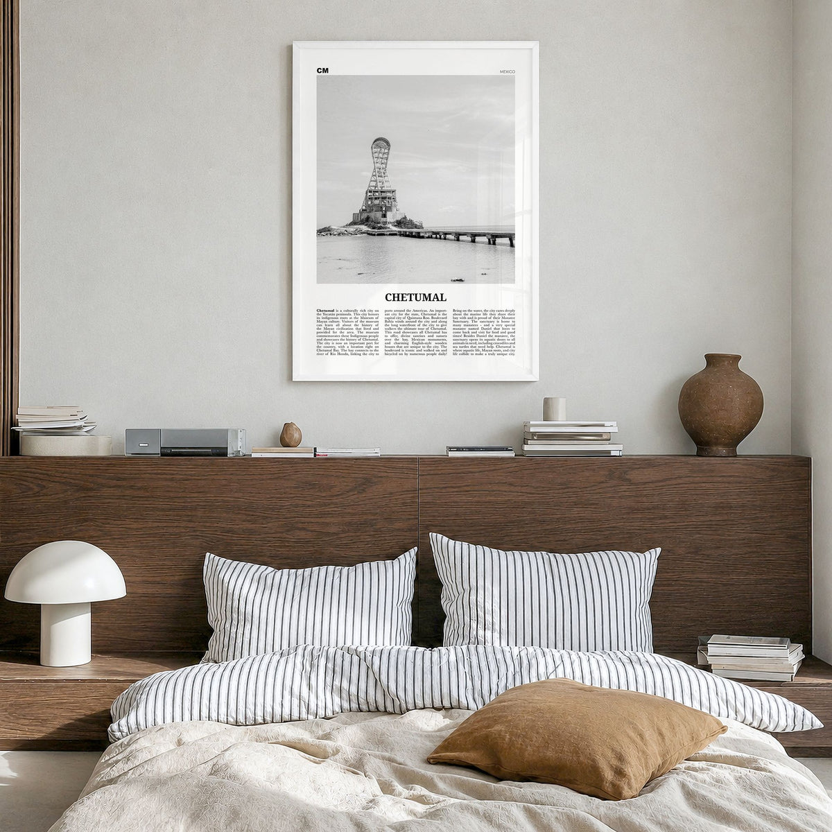 Chetumal Newspaper Poster in a white wood frame, hanging in a bedroom