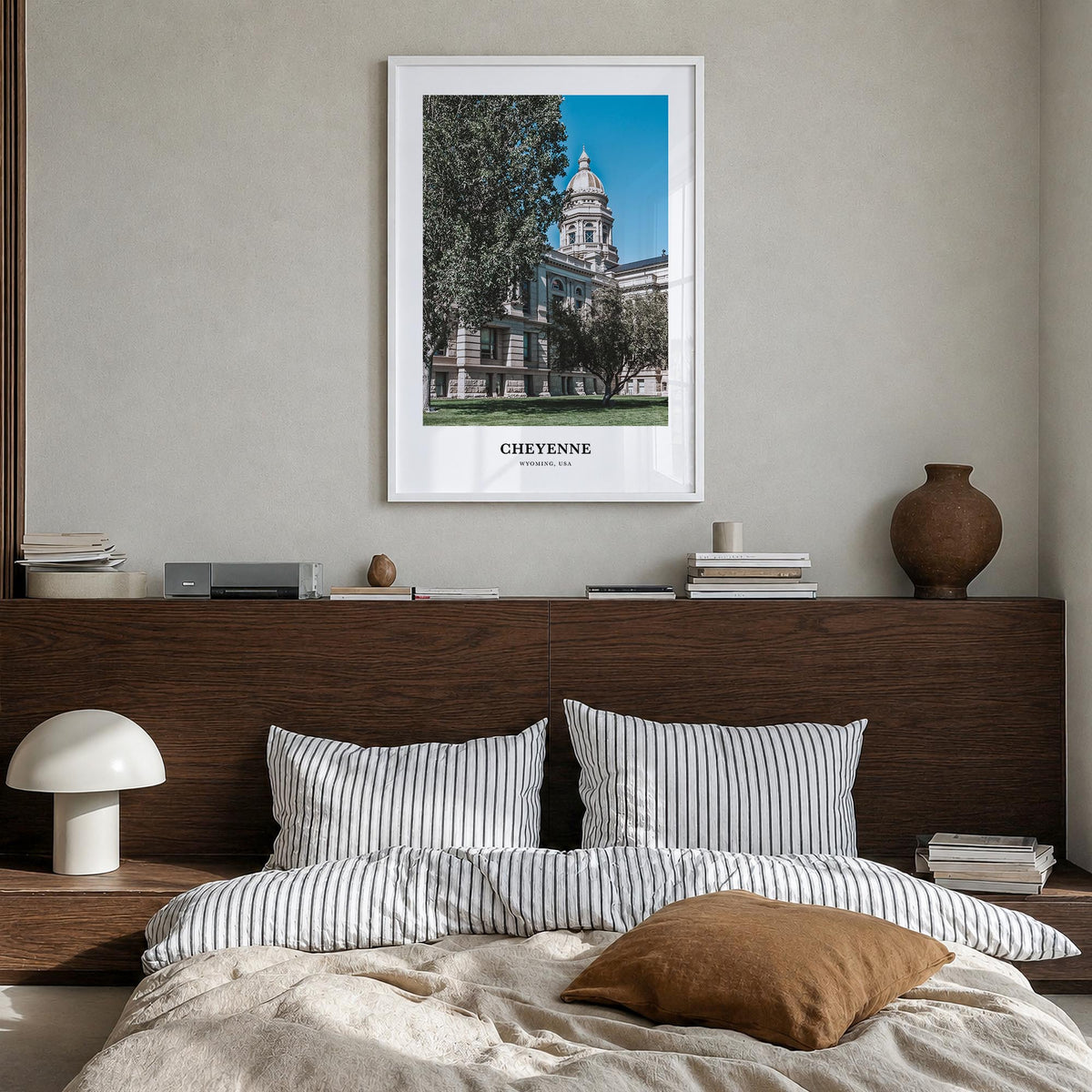 Cheyenne colorful classic poster of Wyoming, USA – vertical wall art in white wood frame, hanging on wall