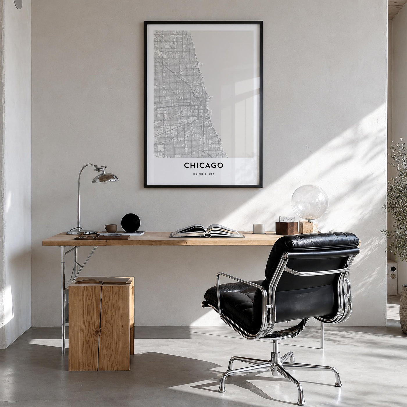 Chicago black & white map poster of Illinois, USA – vertical wall art in black wood frame, hanging on wall