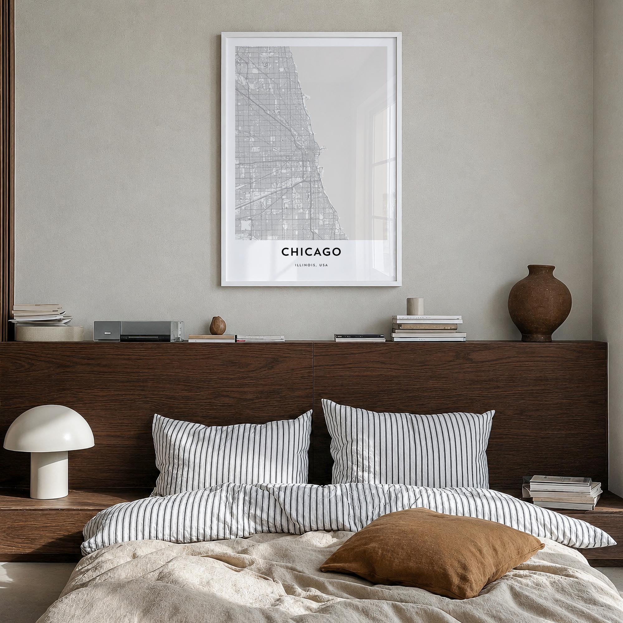 Chicago black & white map poster of Illinois, USA – vertical wall art in white wood frame, hanging on wall
