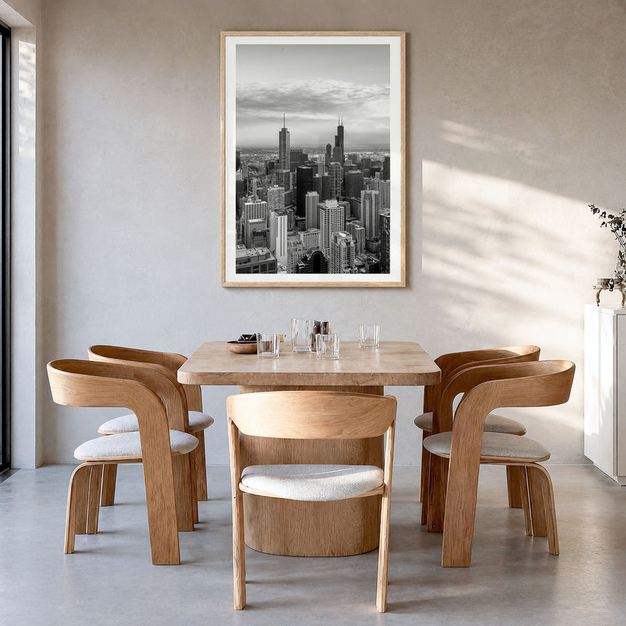 Chicago Photo No 1 Poster in a natural wood frame, hanging in a dining room, white border
