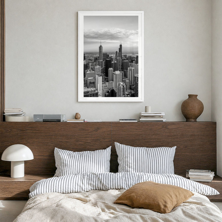Chicago Photo No 1 Poster in a white wood frame, hanging in a bedroom, white border