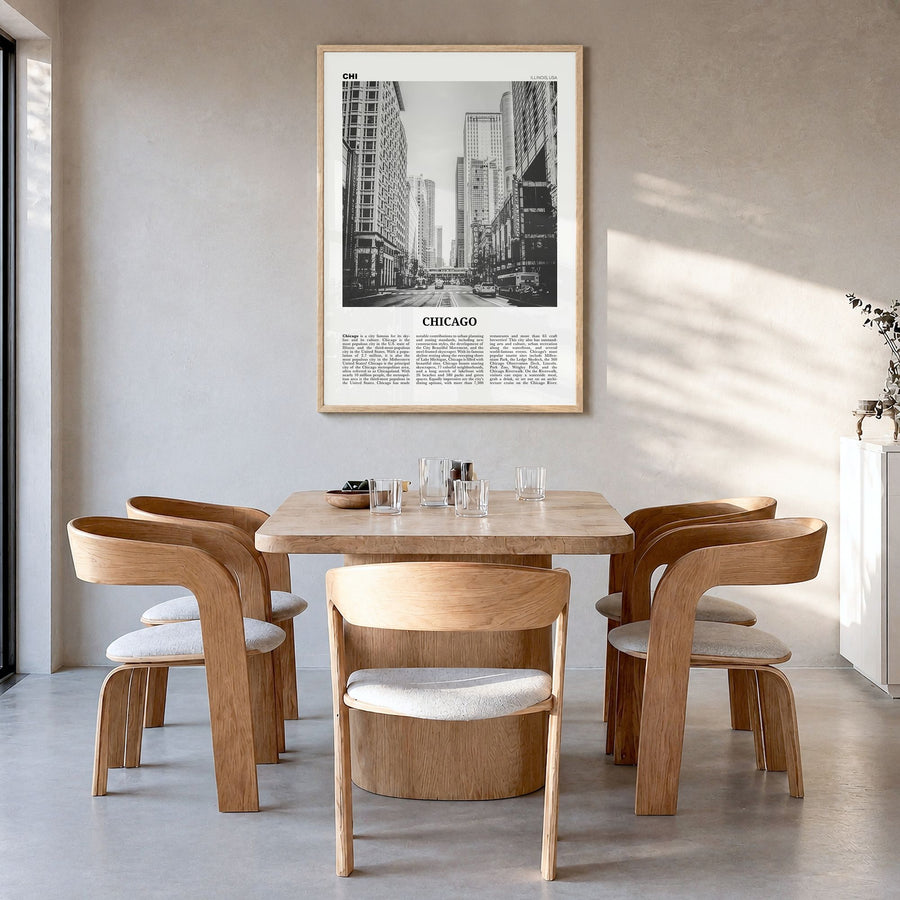 Chicago Newspaper No 3 Poster in a natural wood frame, hanging in a dining room