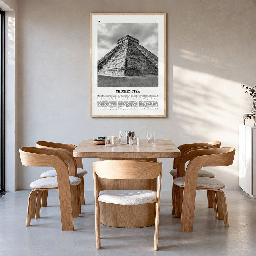 Chichén Itzá Newspaper Poster in a natural wood frame, hanging in a dining room