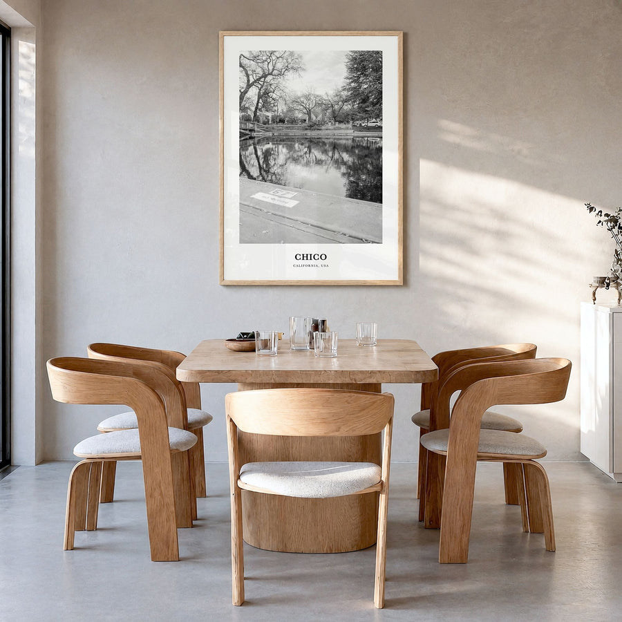Chico Classic Poster in a natural wood frame, hanging in a dining room