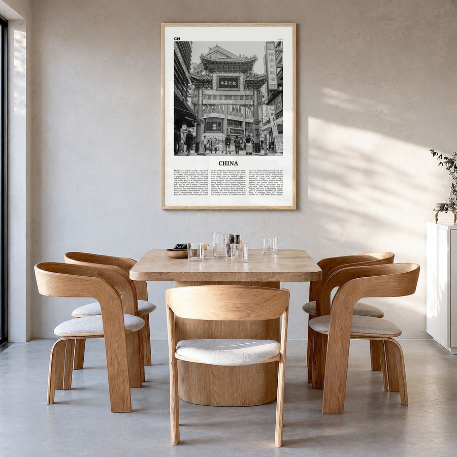 China Newspaper No 3 Poster in a natural wood frame, hanging in a dining room
