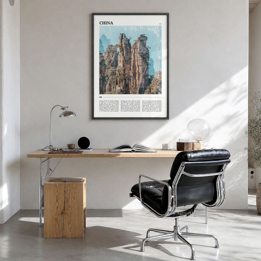China Travel Poster in a black wood frame, hanging in a bright home office