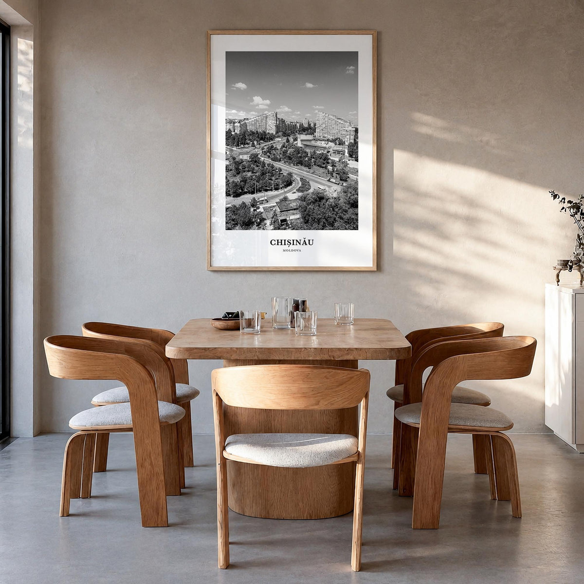 Chișinău black & white classic poster of Moldova – vertical wall art in natural wood frame, hanging on wall