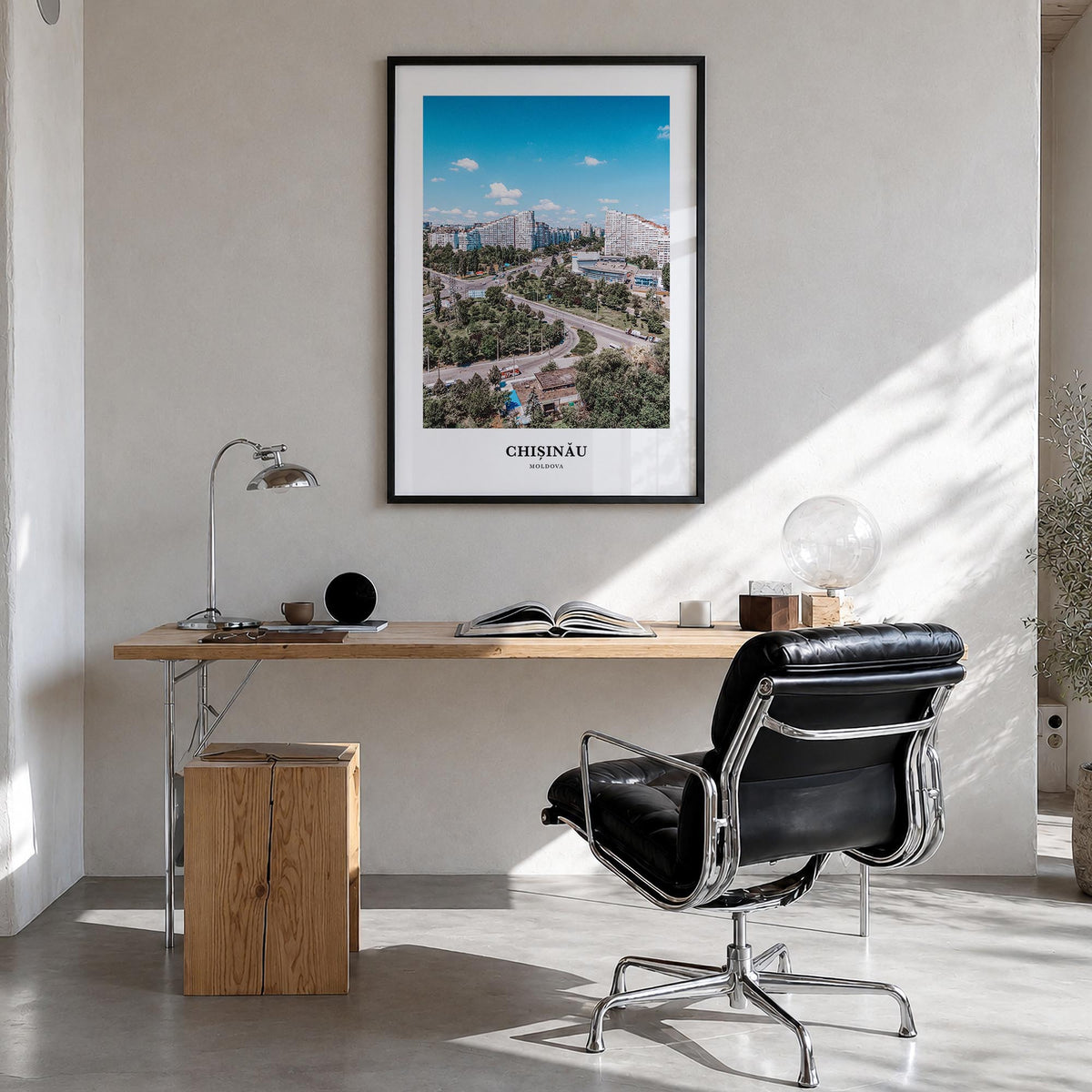 Chișinău colorful classic poster of Moldova – vertical wall art in black wood frame, hanging on wall