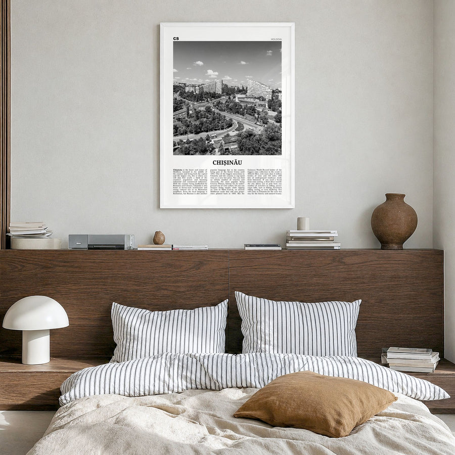 Chișinău Newspaper Poster in a white wood frame, hanging in a bedroom