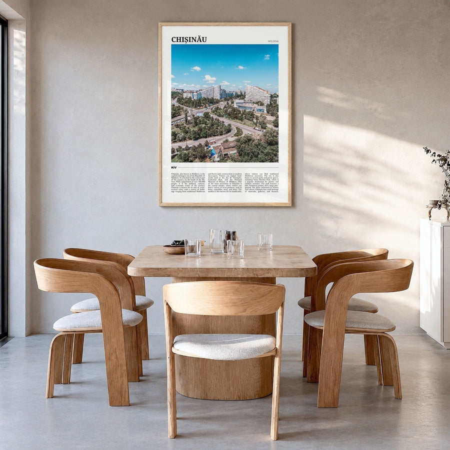 Chișinău Travel Poster in a natural wood frame, hanging in a dining room