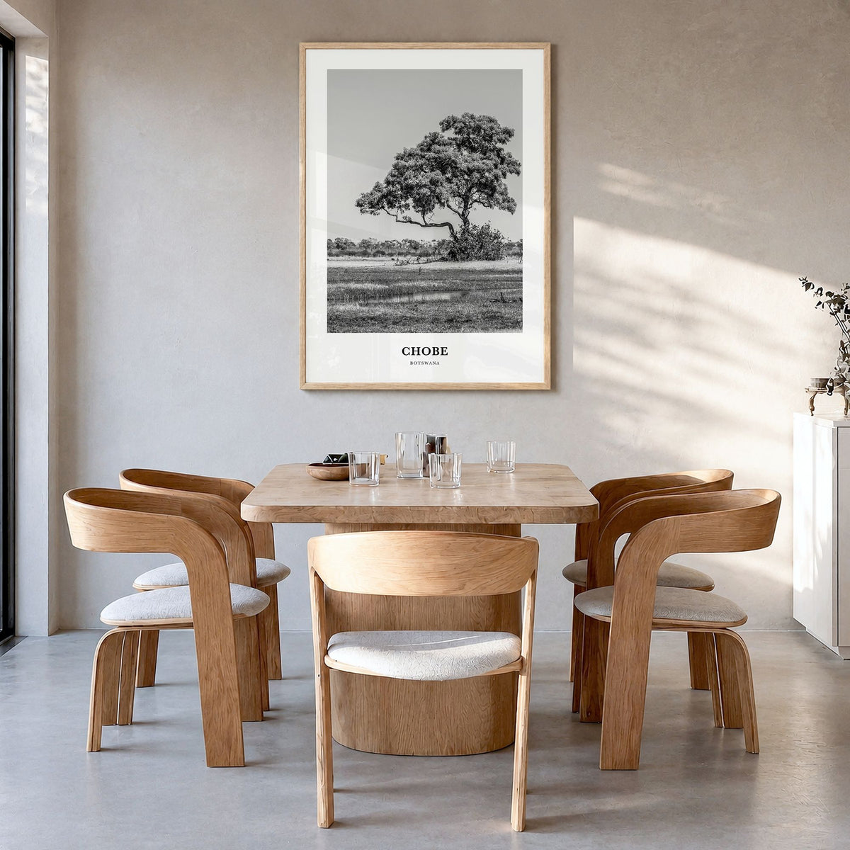 Chobe National Park Classic Poster in a natural wood frame, hanging in a dining room