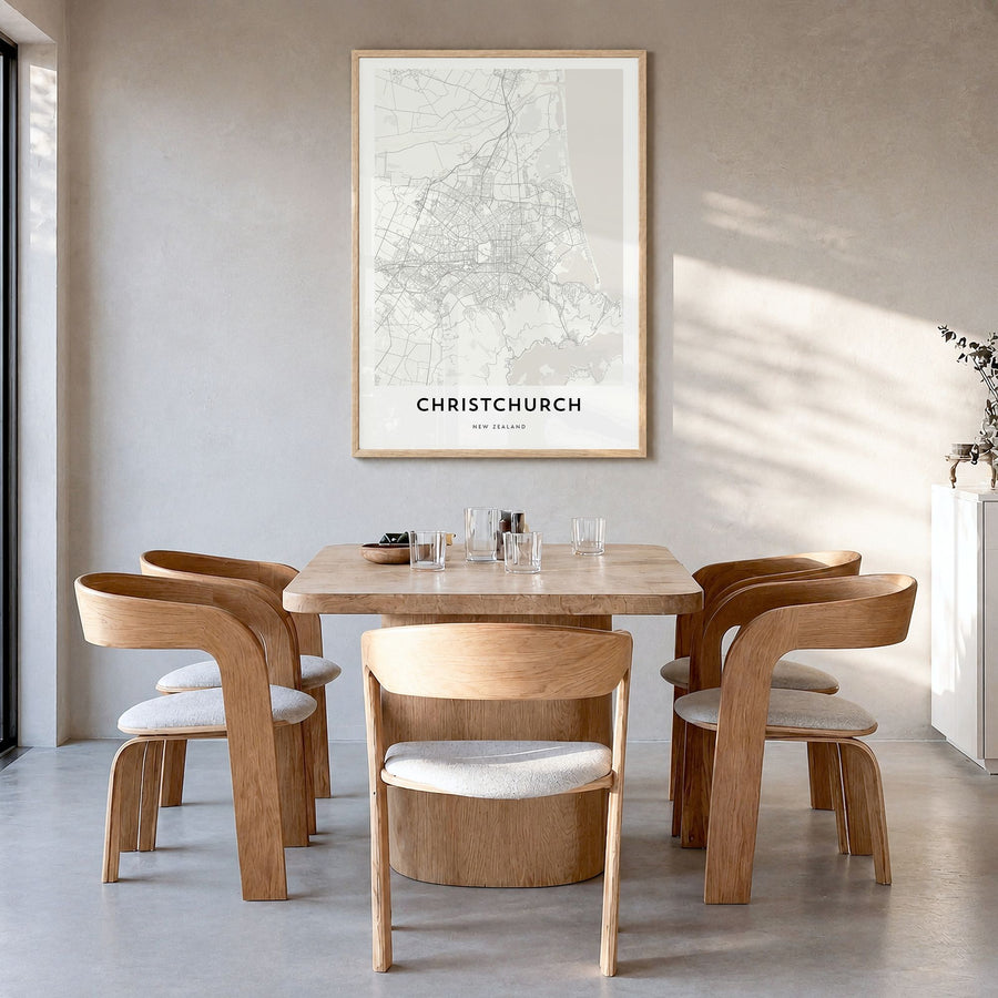 Christchurch Map Poster in a natural wood frame, hanging in a dining room