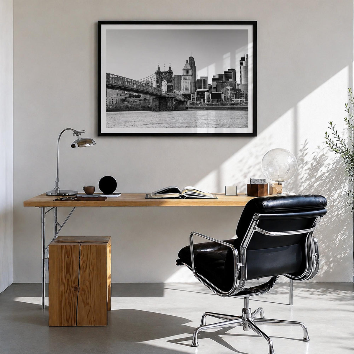 Cincinnati black & white photo poster of Ohio, USA – horizontal wall art in black wood frame with white border, hanging on wa