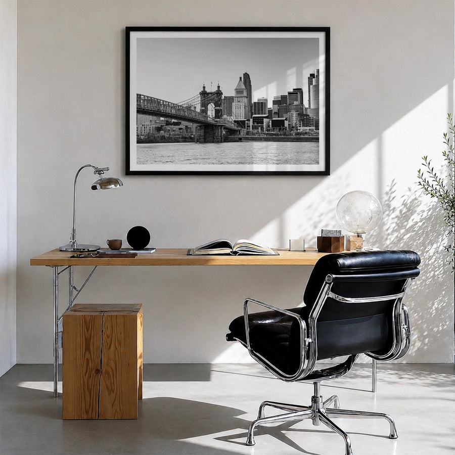 Cincinnati black & white photo poster of Ohio, USA – horizontal wall art in black wood frame with white border, hanging on wa