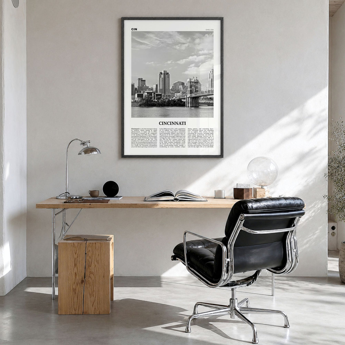 Cincinnati Newspaper No 1 Poster in a black wood frame, hanging in a bright home office