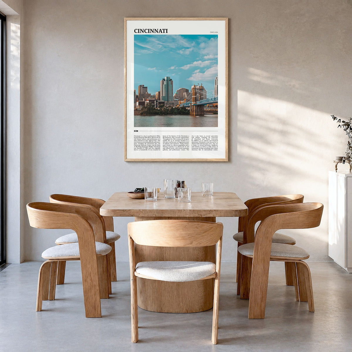 Cincinnati Travel No 2 Poster in a natural wood frame, hanging in a dining room