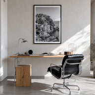 Cinque Terre no. 1 black & white photo poster of Italy – vertical wall art in black wood frame with white border, hanging on 