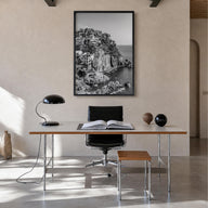 Cinque Terre no. 1 black & white photo poster of Italy – vertical wall art in black wood frame, hanging on wall