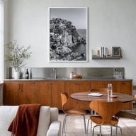 Cinque Terre no. 1 black & white photo poster of Italy – vertical wall art in white wood frame, hanging on wall