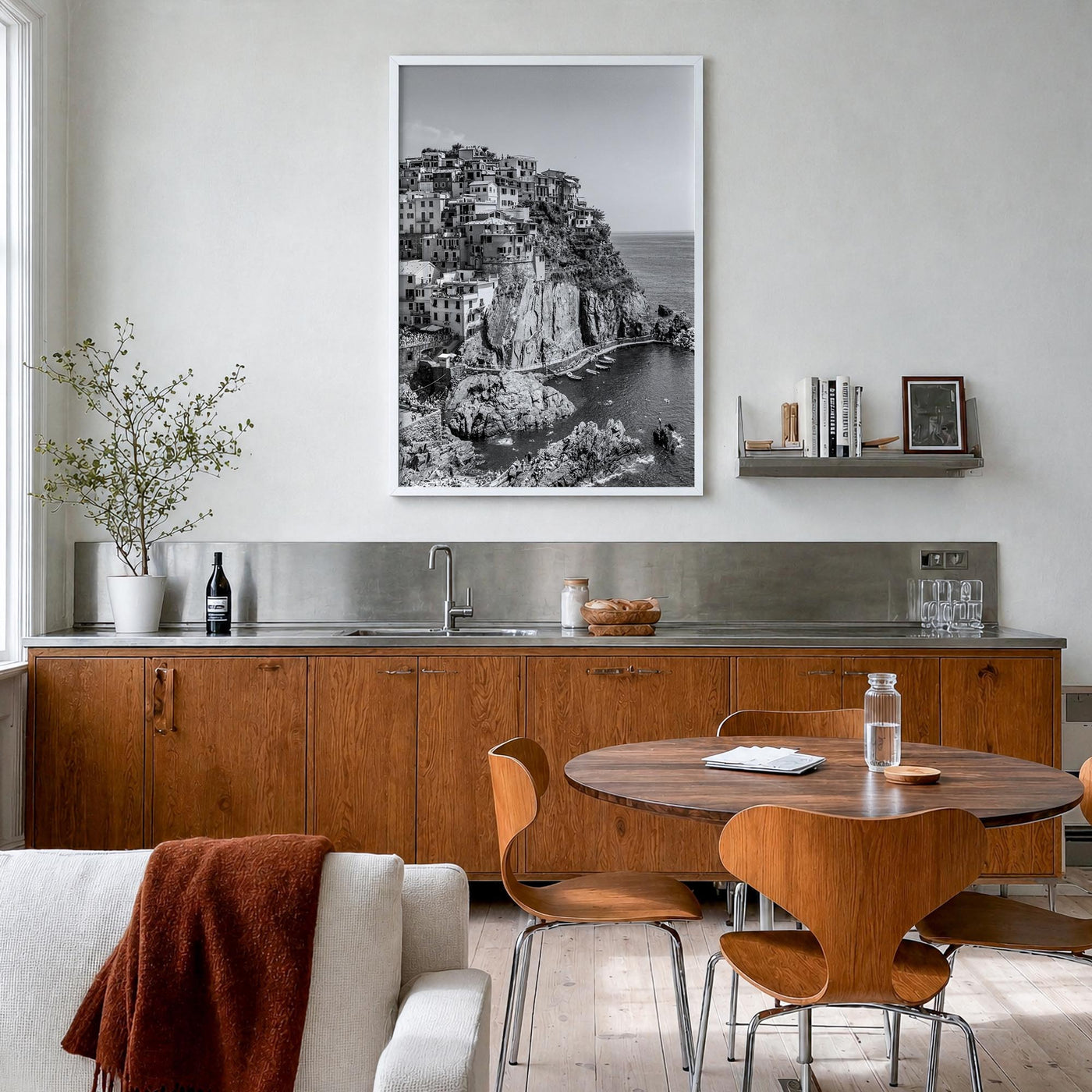Cinque Terre no. 1 black & white photo poster of Italy – vertical wall art in white wood frame, hanging on wall