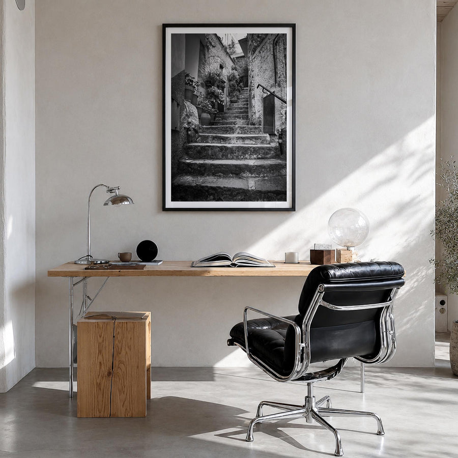 Cinque Terre no. 3 black & white photo poster of Italy – vertical wall art in black wood frame with white border, hanging on 