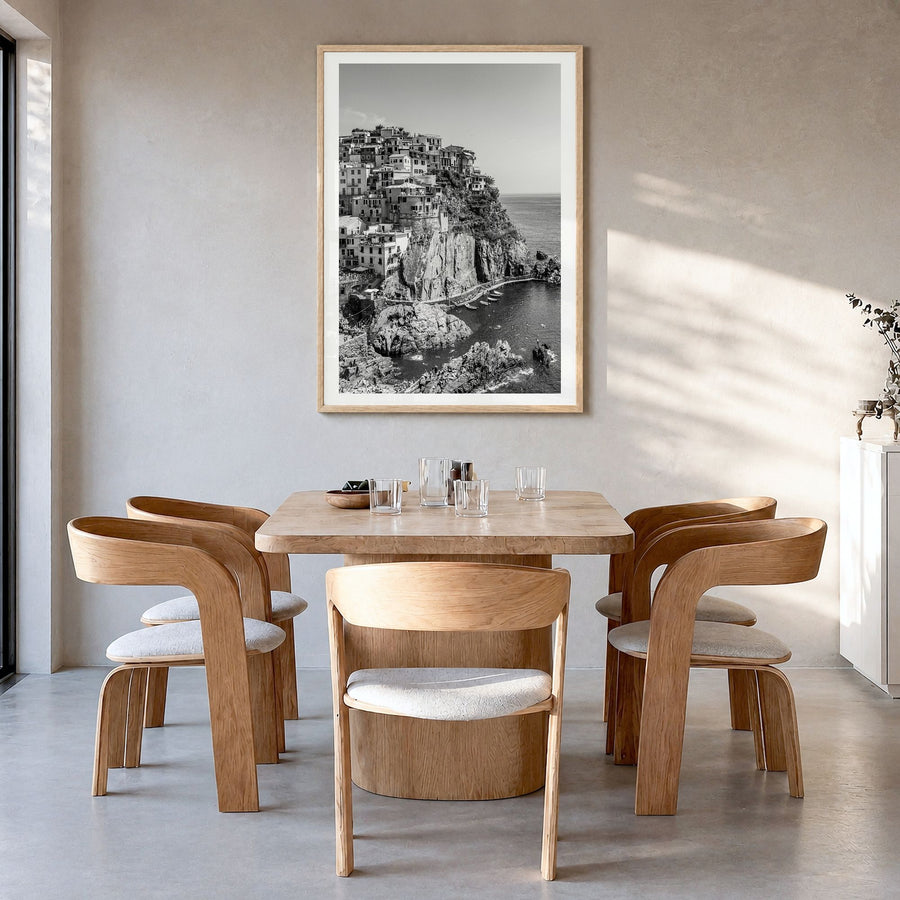 Cinque Terre Photo No 1 Poster in a natural wood frame, hanging in a dining room, white border