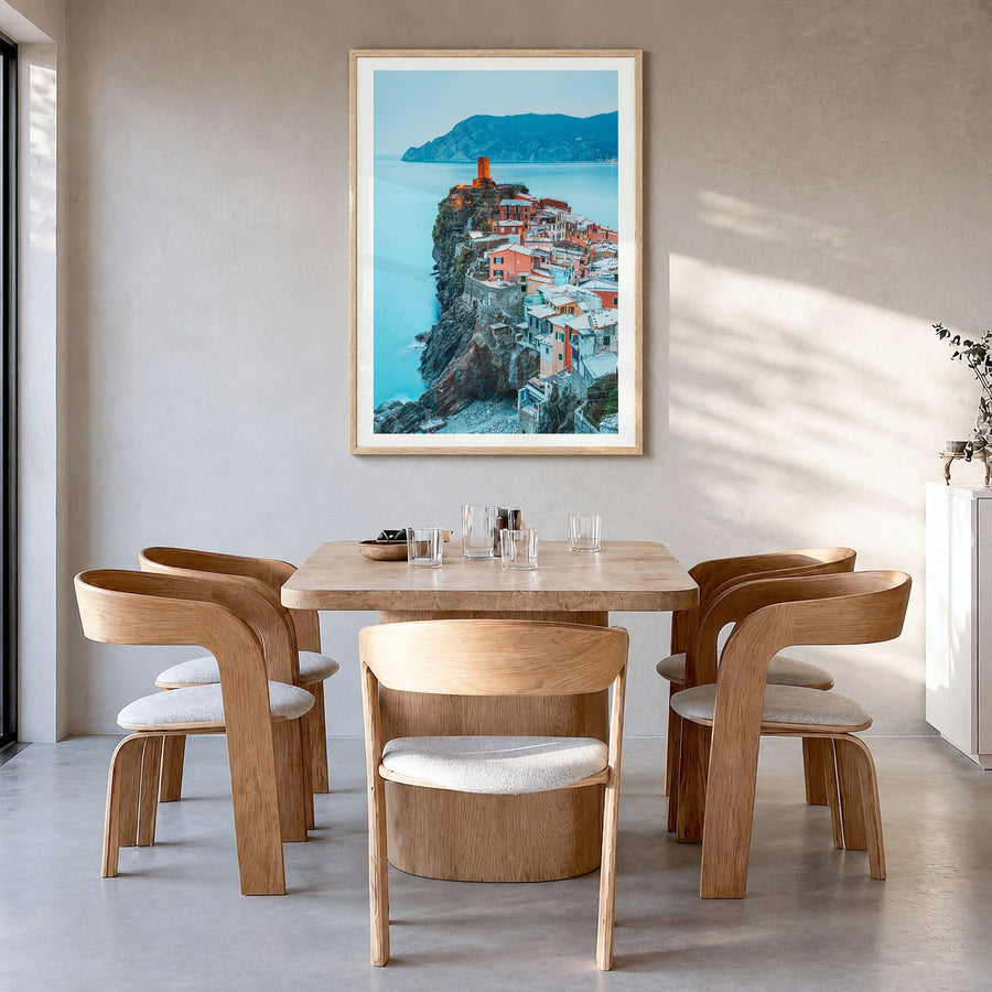 Cinque Terre Photo No 2 Poster in a natural wood frame, hanging in a dining room, white border