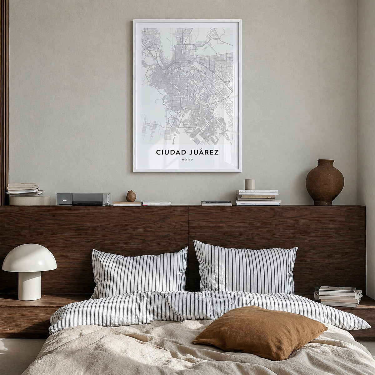 Ciudad Juárez black & white map poster of Mexico – vertical wall art in white wood frame, hanging on wall