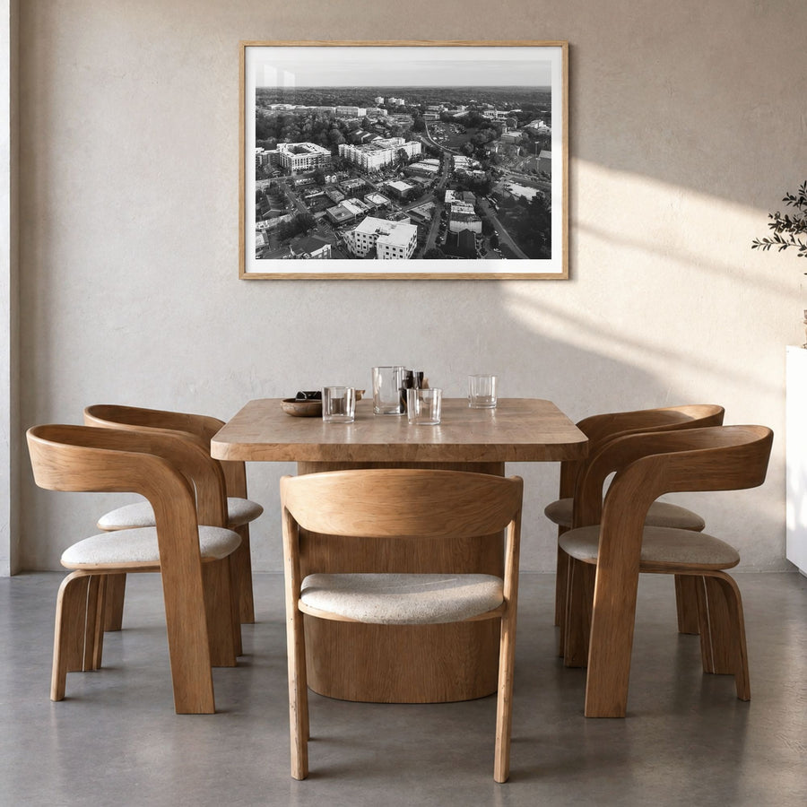 Clemson Photo Poster in a natural wood frame, hanging in a dining room, white border
