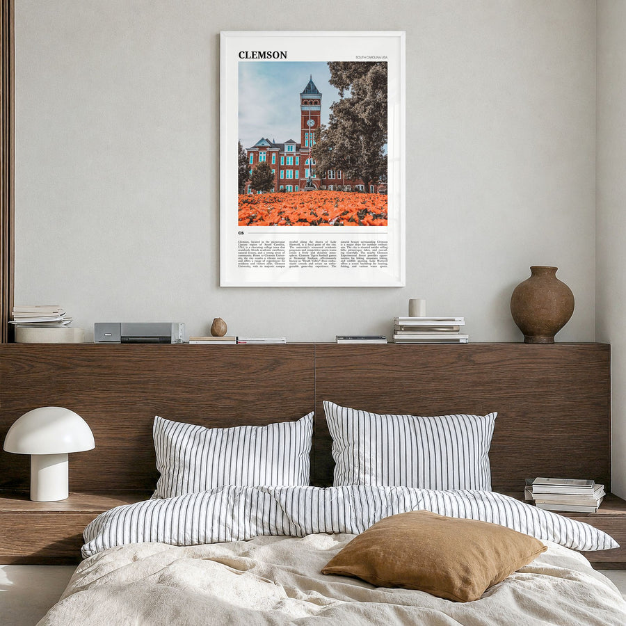 Clemson Travel Poster in a white wood frame, hanging in a bedroom