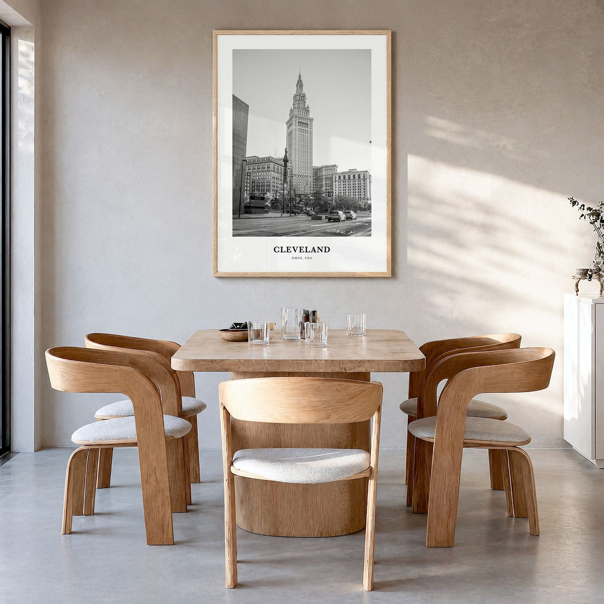 Cleveland Classic No 2 Poster in a natural wood frame, hanging in a dining room