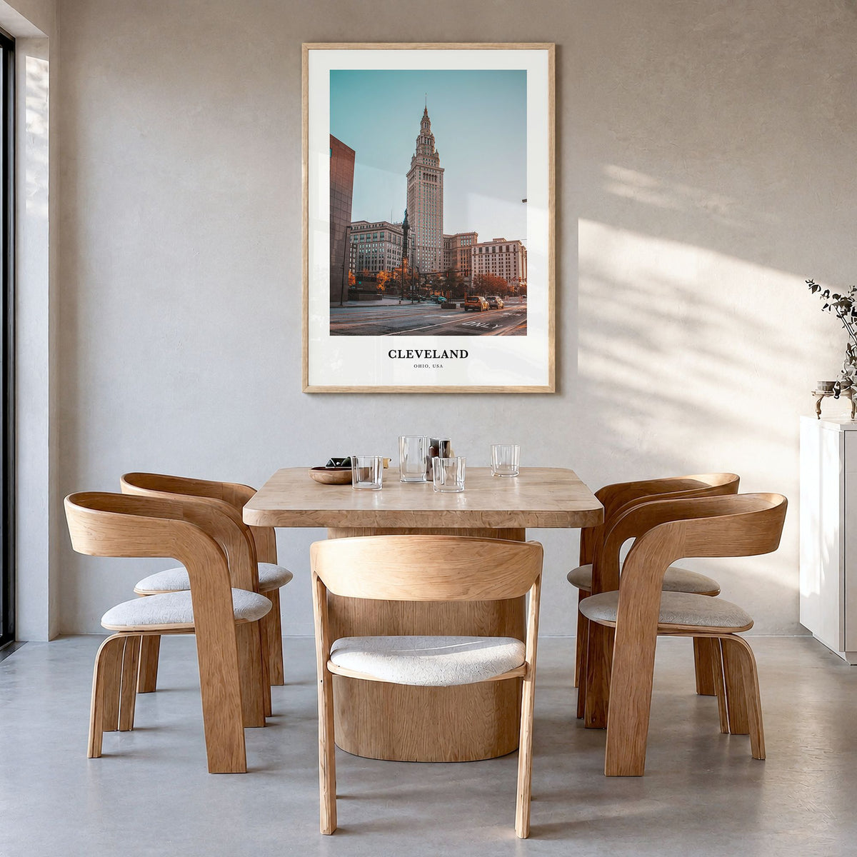 Cleveland Classic No 1 Poster in a natural wood frame, hanging in a dining room