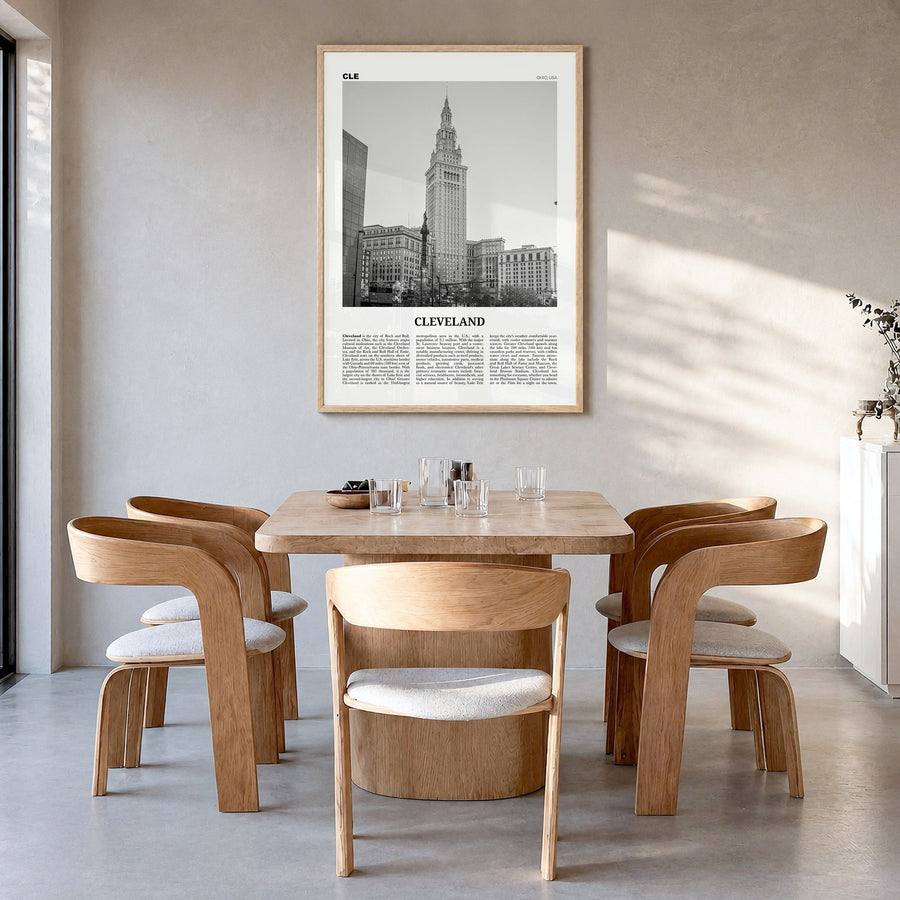 Cleveland Newspaper No 3 Poster in a natural wood frame, hanging in a dining room
