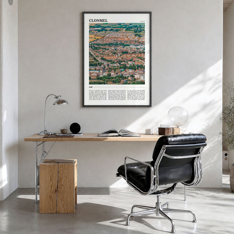 Clonmel Travel Poster in a black wood frame, hanging in a bright home office