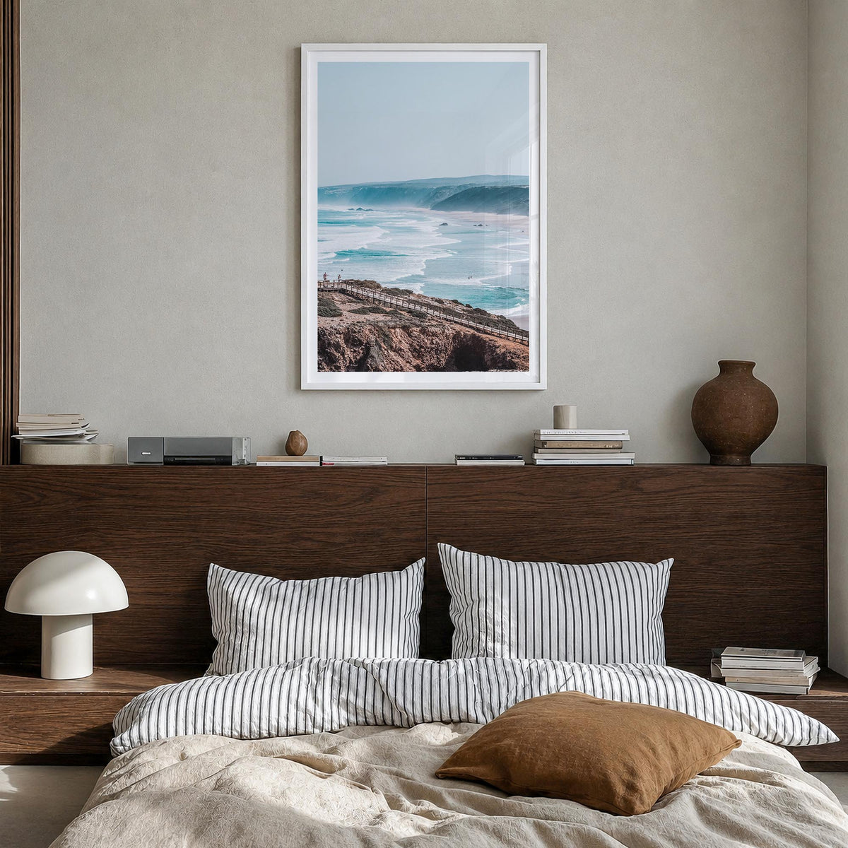 Coastline Waves colorful photo poster – vertical wall art in white wood frame with white border, hanging on wall