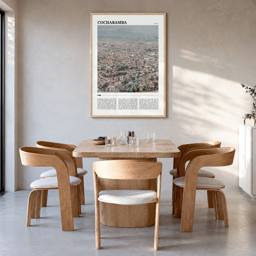 Cochabamba Travel Poster in a natural wood frame, hanging in a dining room