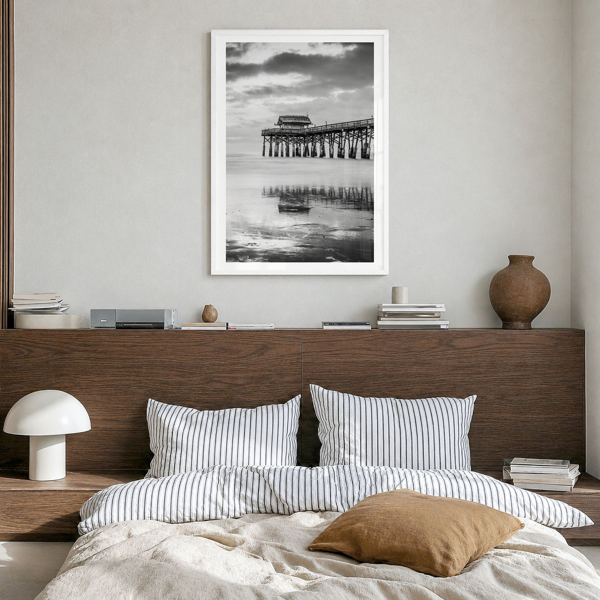 Cocoa Beach Photo Poster in a white wood frame, hanging in a bedroom, white border