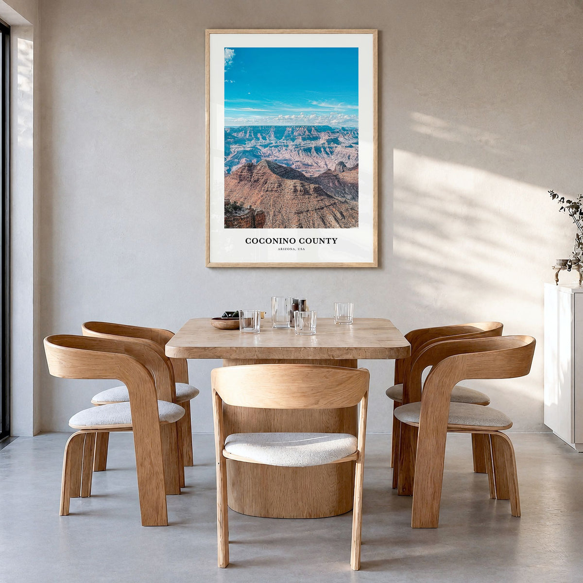 Coconino County Classic Poster in a natural wood frame, hanging in a dining room