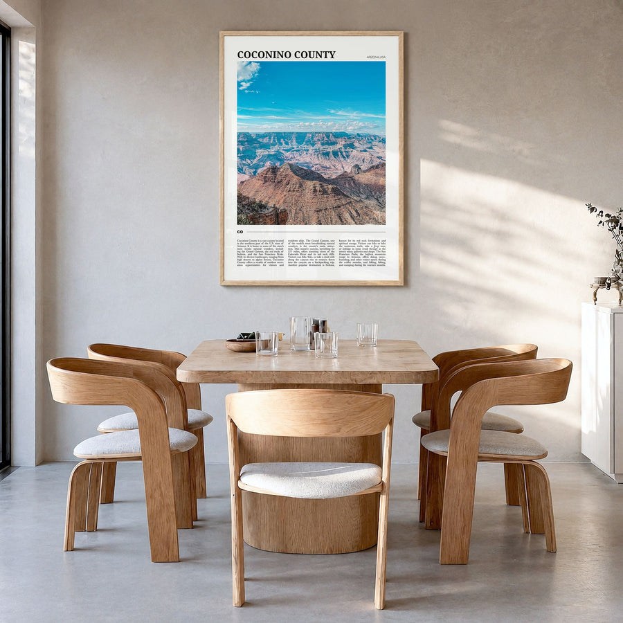 Coconino County Travel Poster in a natural wood frame, hanging in a dining room