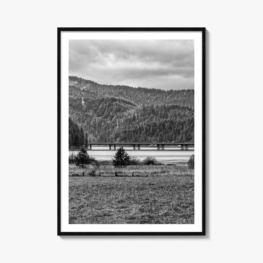 Coeur d'Alene black & white photo poster of Idaho, USA – vertical wall art, unframed print shown in interior mockup