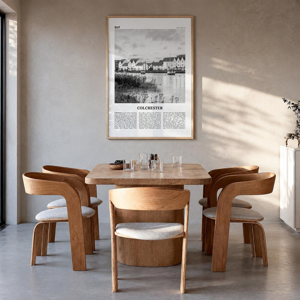Colchester black & white newspaper poster of United Kingdom – vertical wall art in natural wood frame, hanging on wall