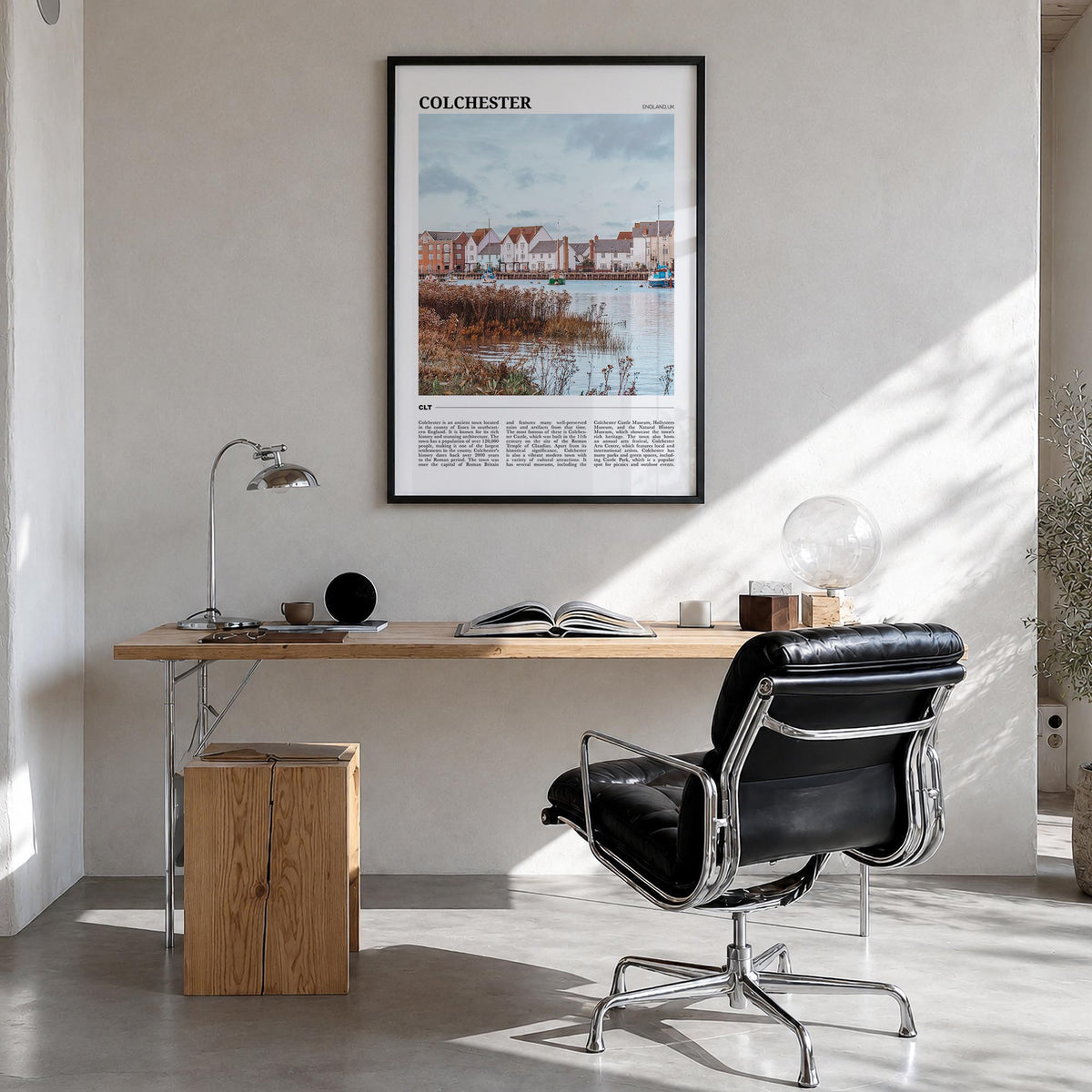 Colchester colorful travel poster of United Kingdom – vertical wall art in black wood frame, hanging on wall