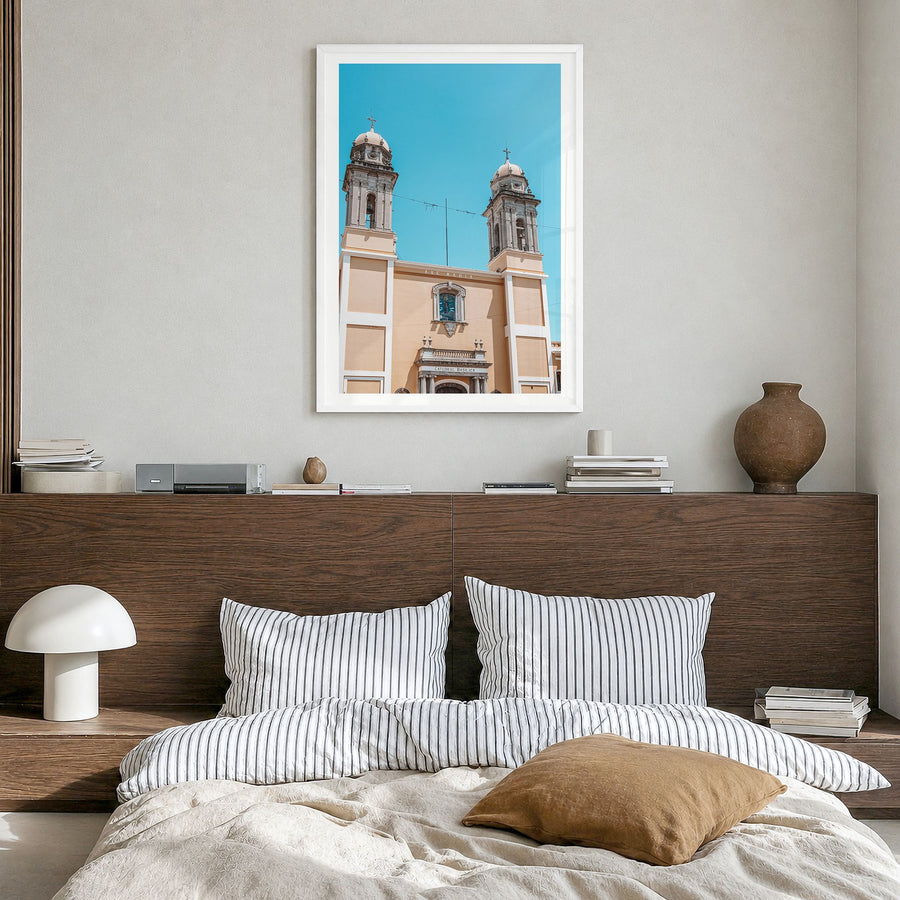Colima Photo Poster in a white wood frame, hanging in a bedroom, white border